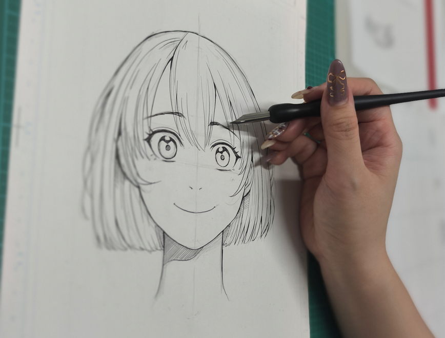 Manga workshop instructor drawing